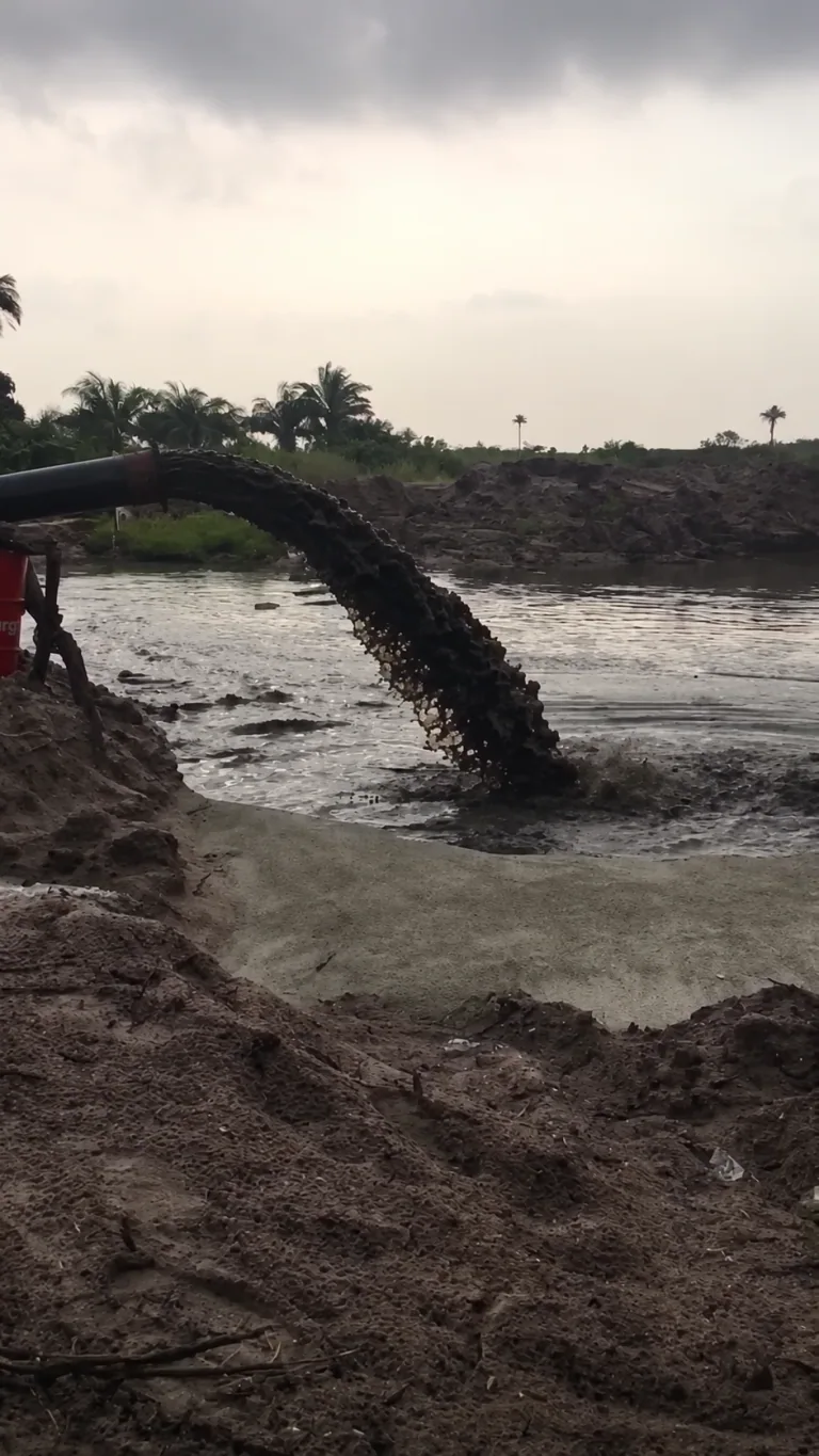 AI-enhanced company-supplied photo: Slurry flows from a discharge pipe into the placement area
